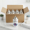 Cargar la imagen en la vista de la galería, Pack aerosol neutralizador de olores profesional 250ml Serviaroma Shop, con toallas blancas y plantas suculentas sobre encimera de mármol blanco
